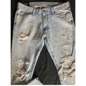 Abercrombie & Fitch Men’s slim fit super distressed jeans.